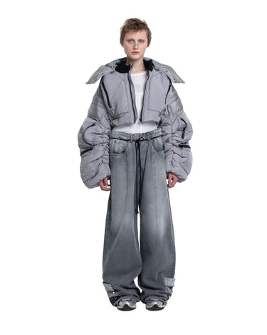 Gray cropped puffer jacket with hood, front zipper, and relaxed fit