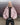 Pink hooded nylon jacket with two chest pockets and front zipper, worn model