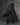Long hooded dark cape with front button placket and scattered silver details