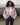 Pink hooded nylon jacket with flap pockets and snap collar, worn on model