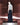 Dark navy men’s jeans on mannequin, straight wide-leg cut with button fly