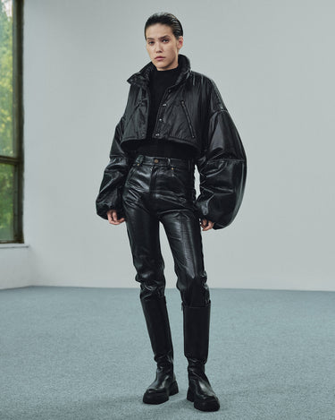 Cropped black puffer jacket with voluminous sleeves and a button front