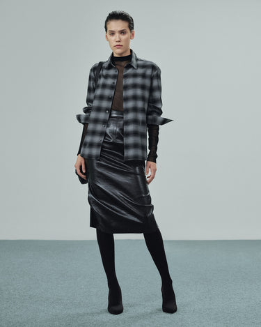 Grey plaid button-up shirt with long sleeves and button placket