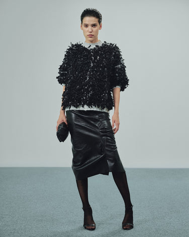 Black shredded sweater with short sleeves and crew neck