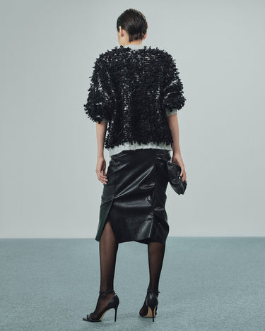 Black shredded sweater with short sleeves, back view