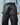 Black faux leather loose pants with belt loops, zip fly, and front patch pockets