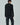 Black long-sleeve shirt from back view with petal ruffle shoulders
