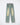 Light blue six-pocket jeans with ripped knees and straight-leg fit