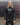Men's black leather-look jacket with center front zipper and stand collar