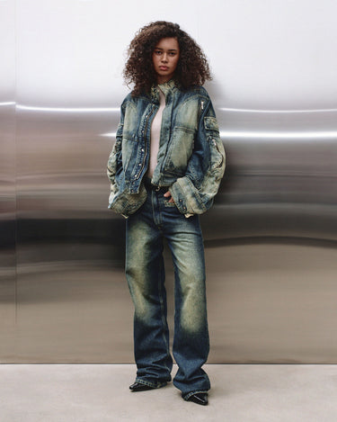 Faded blue hooded denim jacket with front zipper, chest pockets, and relaxed silhouette