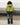 Green nylon TMBY jacket back view with hood and gathered shoulders