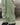 Light green track pants close-up: textured fabric with elastic cuff at hem
