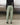 Light green track pants with elastic waistband and ankle cuffs