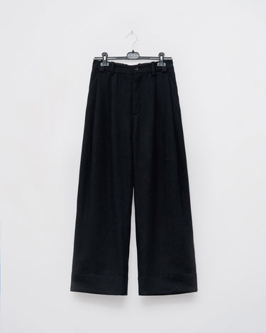 Black wide-leg trousers with a high waist and cuffed hems