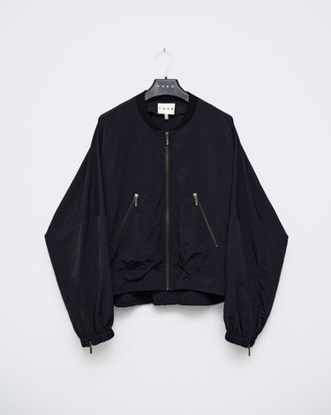 Black balloon bomber jacket with front zipper and snap pockets