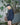 Dark balloon bomber jacket worn with ribbed collar and zip front