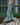 Light blue faded six-pocket jeans with wide straight legs