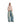 Washed blue distressed baggy jeans, wide leg silhouette with black drawstring tie.