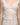 White lace slip dress with sheer mesh, floral embroidery, and scalloped trim