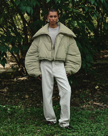 Light green puffer jacket with turn-down collar and front zip, long sleeves