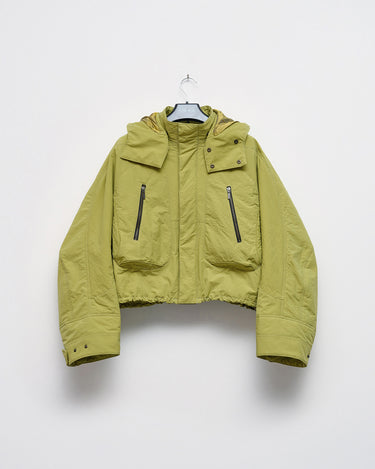 Green nylon TMBY jacket on hanger with hood and zip pockets