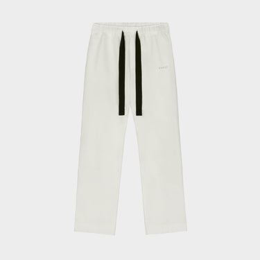 Cream straight-leg sweatpants with black drawstrings and small THEO logo