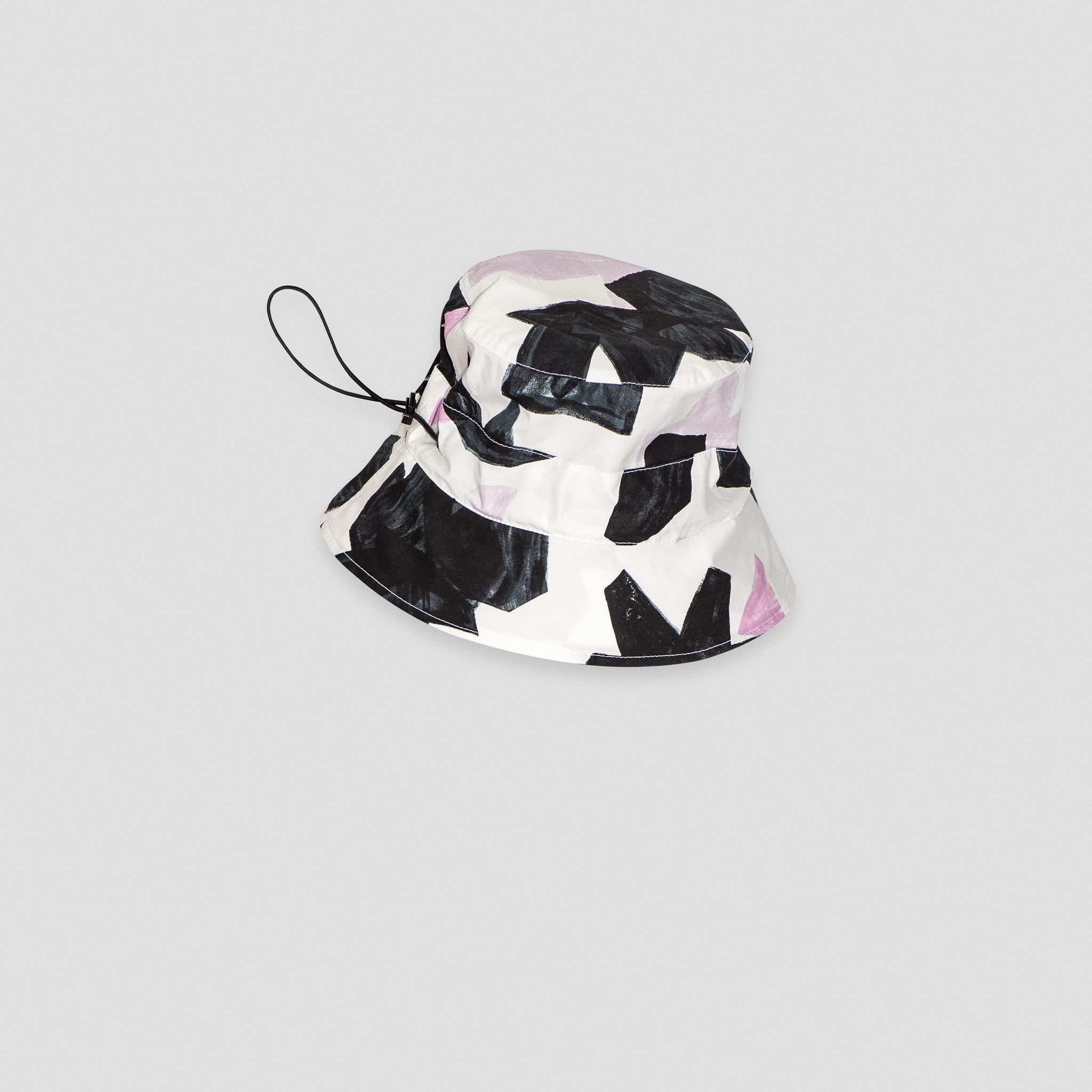 BUCKET HAT WITH DRAWSTRINGS — FLORAL PRINT ON WHITE