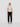 Black cropped sweatpants with drawstring waist; worn by model in front view.