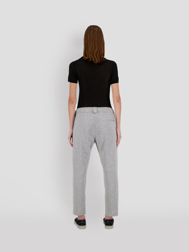 Cropped gray sweatpants with elastic cuffs and back yoke seam