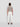 Cropped white sweatpants with black drawstring and small Theo logo, rear view
