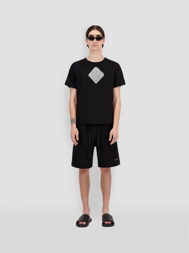 Black jersey T-shirt with crew neck, short sleeves, and white 3D rhombus print
