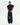 Black sleeveless tuxedo shirt with a button front and wide, cropped silhouette