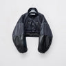 Cropped black puffer jacket with a high collar, button front, and oversized sleeves