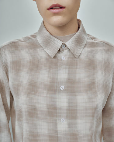 Beige plaid dress shirt collar with white buttons and front placket