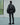 Cropped black puffer jacket with an oversized fit, shown from the back