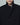 Black blazer with a high collar, one-button front, and welt chest pocket
