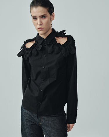 Black shirt with petal ruffle shoulders, button front, pointed collar and long sleeves