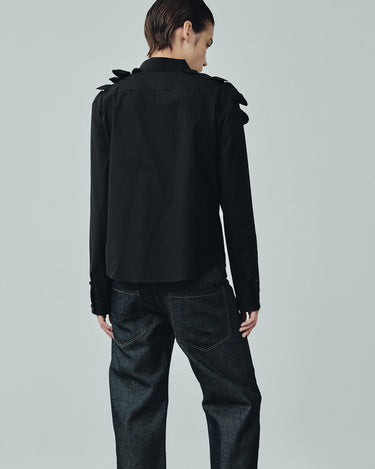 Black long-sleeve shirt from back view with petal ruffle shoulders