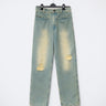 Light blue six-pocket jeans with ripped knees and straight-leg fit