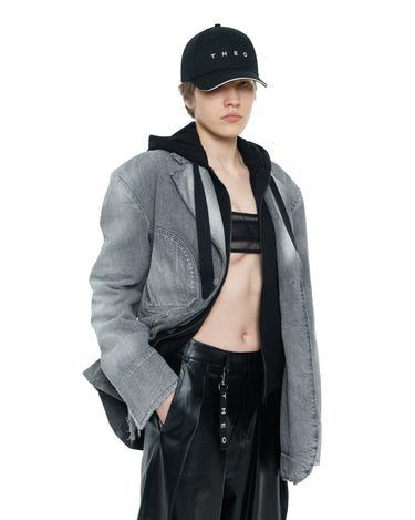 Black baseball cap with THEO logo and hanging keychain strap