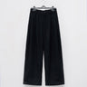 Black wide-leg trousers with a high waist and cuffed hems