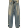 Washed blue distressed baggy jeans, drawstring waist and wide straight legs.