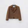 Brown melange blazer on a hanger, showing notched lapels, chest pocket, and two-button front
