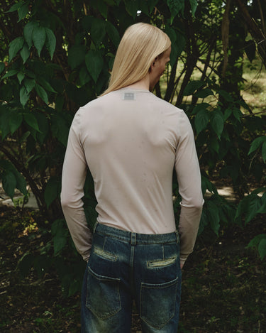 Nude sheer mesh long-sleeve turtleneck top, back view