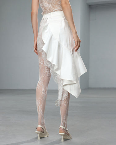 White denim skirt with asymmetric layered hem and draped front