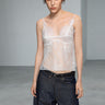 White lace camisole top with thin straps and scalloped V neckline