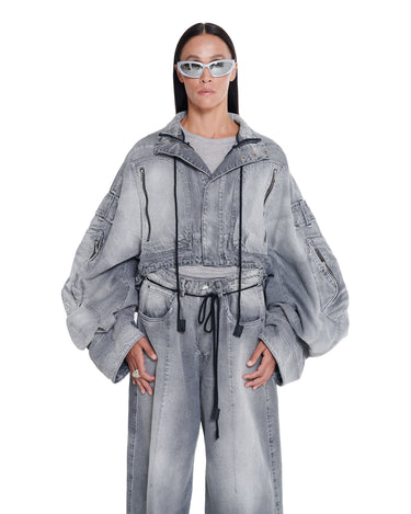 Distressed cropped gray denim jacket with point collar and drawstring waist, front view