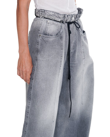 Distressed baggy jeans in light gray wash with drawstring tie and side pockets