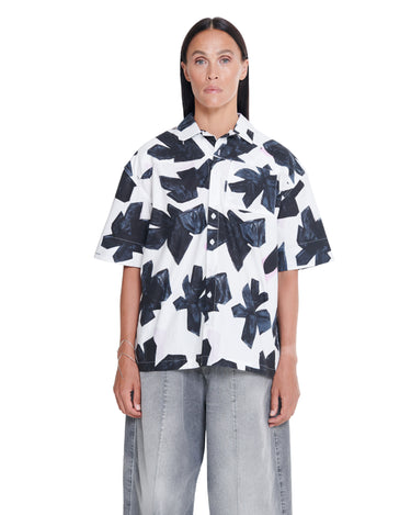Printed camp shirt with short sleeves, button front, black abstract shapes on white.