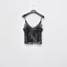Black lace camisole top with thin spaghetti straps and sweetheart neckline.